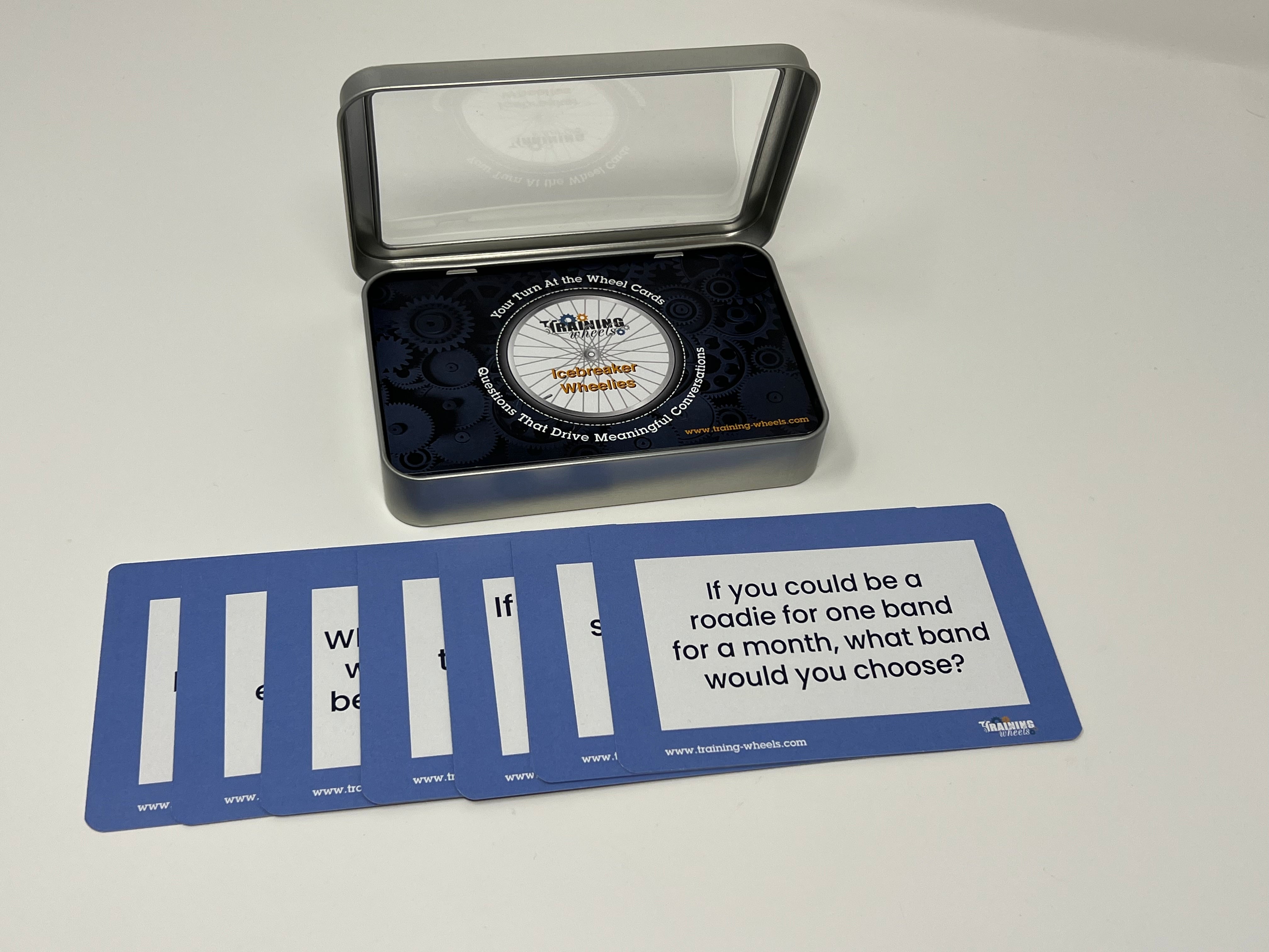 Icebreaker Wheelies card deck with 65 unique icebreaker questions in a plastic container, perfect for group introductions and openers.