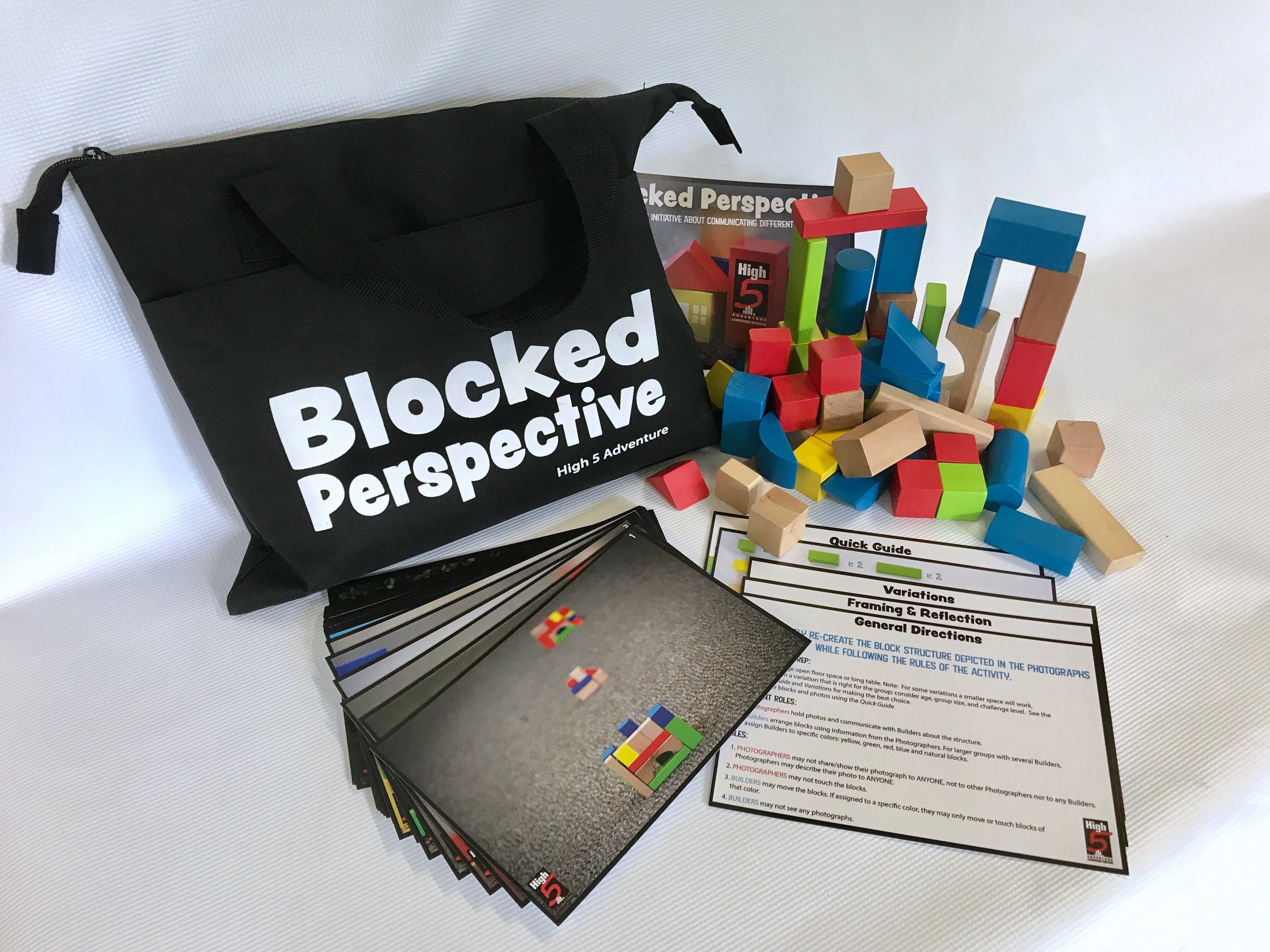 Blocked Perspective activity kit with colorful blocks, photo cards, and carrying case for group communication and perspective-building exercises.