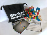 Blocked Perspective activity kit with colorful blocks, photo cards, and carrying case for group communication and perspective-building exercises.
