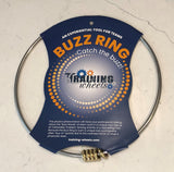 Buzz Ring activity prop with washers spinning on a large ring, used for interactive teamwork and communication exercises.