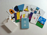 A spread of 52 colorful Chiji Cards, each featuring a unique image, arranged for group reflection activities.