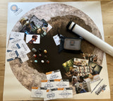 Hole to Wholeness activity set with double-sided tarp, three card decks (Medicators, Resources & Solutions, Metaphor Cards), and game pieces for experiential recovery discussions.