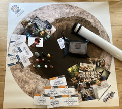 Hole to Wholeness activity set with double-sided tarp, three card decks (Medicators, Resources & Solutions, Metaphor Cards), and game pieces for experiential recovery discussions.