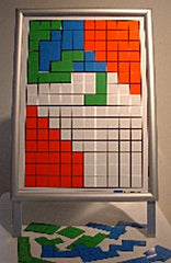 Simmetrics™ single board game setup with a metallized write-on wipe-off surface and carrying case, illustrating teamwork and strategic planning.