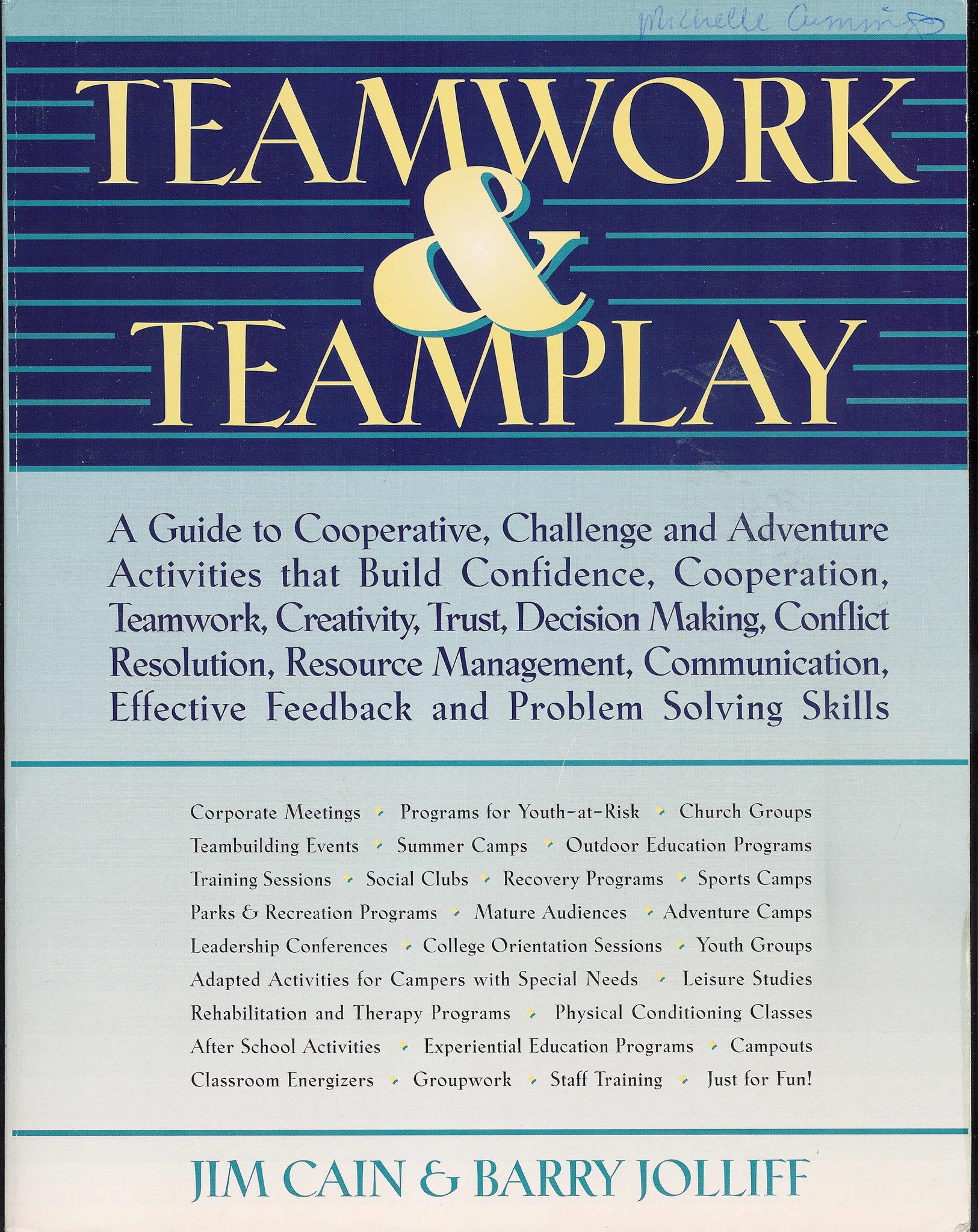 Cover of the 'Teamwork & Teamplay' book which is a guide for teambuilding activities with blue and white text design.
