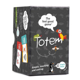 Players forming totems with animal and quality cards, sharing strengths and positive traits in a group setting.