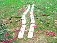 Boardwalkers set with 8 jointed wooden boards, rope handles, and connectors, arranged for group movement and team-building challenges.