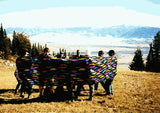 Lycra Tube in vibrant colors, arranged in a loop and used by a group for movement, balance, and cooperative activities.