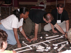 Teamplay Tubes with tubing and connectors, arranged for group problem-solving, teamwork, and creative building activities.